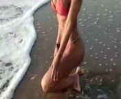 Posing in the beach from nude girl in sea b