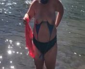 Getting topless in the river from nude indian bath kid river