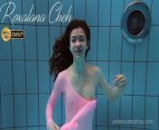Roxalana Cheh wearing pink dress in the pool from swim wear solo