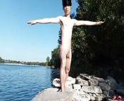 Gay twink does naked yoga outside on a rocky beach, gay cruising men passing by might watch himNaked Asian boy doing yoga outd from gay xxx pics might