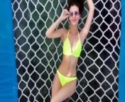 Victoria Justice laying out in a yellow bikini from victoria justice xxx