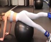 Candice Swanepoel doing stretches on a stability ball from candice swanepoel