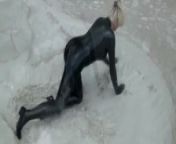 Super Hot Blond Girl In Black Latex Catsuit + High Heels And Sunglasses Bathes In The Mud - Mud Bath from muqd