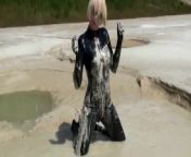 Super Hot Blond Girl In Black Latex Catsuit + High Heels And Sunglasses Bathes In The Mud - Mud Bath from lodo and bhosh
