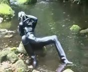 Outdoor walk in the wood and river bath full encased in black latex catsuit and rubber gas mask from indian river bath aumty naked videodeshi naika mo aliya bhat xxx