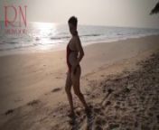 Nice lady at lonely nudist beach. Red swimsuit. Red bikini. from fkg